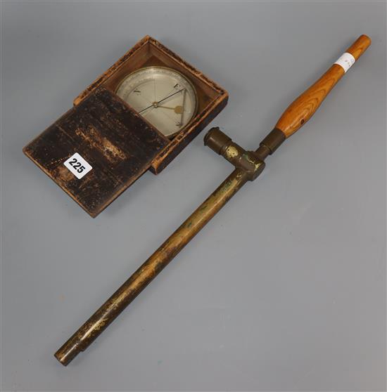 A WWI periscope and a brass-framed compass